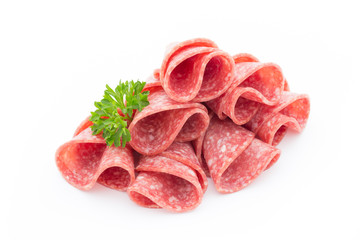 Salami sausage slices isolated on white background.