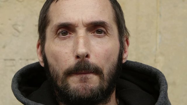 Close-up of an homeless begging for money on the street
