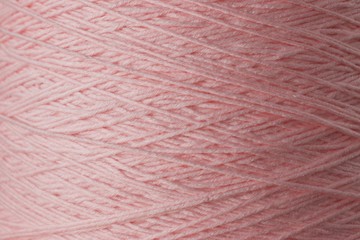 Light Pink Yarn Threads close up macro shot background texture