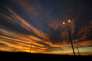 Obraz premium Sunset sky atmosphere make dark multicolor tone on sky or street light against a twilight sky background