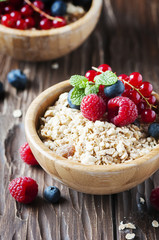 Homemade muesli with berry and mint
