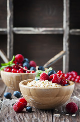 Homemade muesli with berry and mint