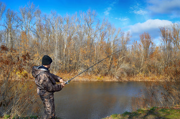 A fisherman on the river