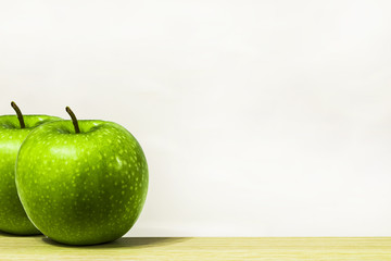 green apple on a white background ripe juicy fruit, wholesome food