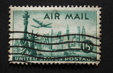 Old postage stamp from USA 15 cents with statue of liberty