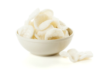 Bowl of indonesian prawn crackers isolated