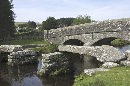 Clapper Bridge, mid span missing, and Dart Bridge, Belever Forest, near Postbridge, Dartmoor National Park, Devon