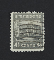 The white house on a vintage postage stamp