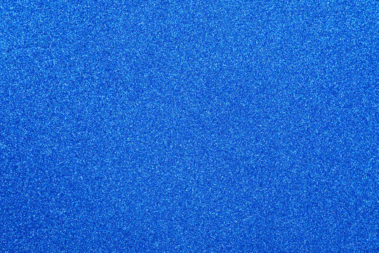 Focused blue abstract glitter background