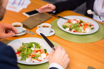 woman and man on business lunch