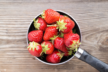 strawberries in a dipper
