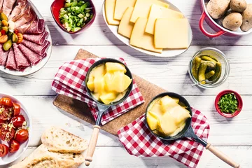 Fototapete Rund Tasty fresh raclette buffet with side dishes © exclusive-design