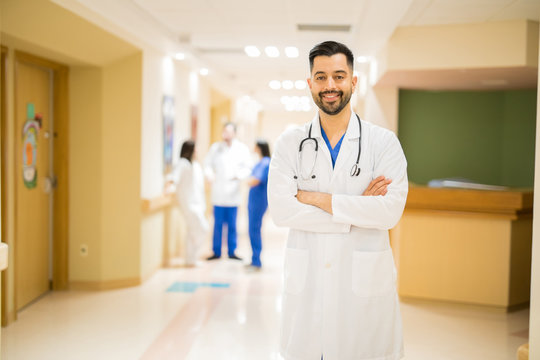 Attractive doctor in a hospital hallway