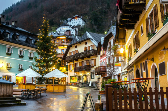 Small Mountain Village Decorated for Christmas on a Rainy Night
