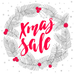 Xmas sale wreath, new year decoration with lettering.