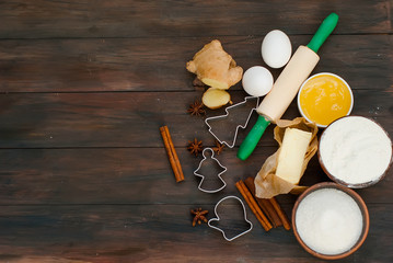 Fototapeta na wymiar ingredients for baking gingerbread on a dark table, background,