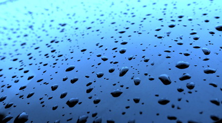 water drops after the rain on the glass