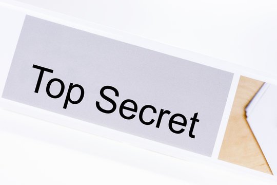 Office folder with the label Top Secret on white background