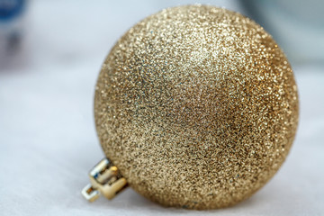 Golden christmas ball, closeup