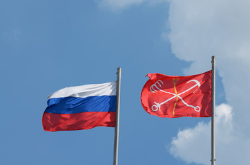The flag of Russia and flag of St. Petersburg.