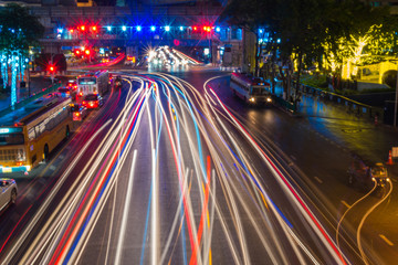 Fototapeta na wymiar Defocused lights car traffic jam of a street road at night retro color effect