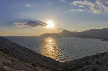 The low late afternoon sun over the coastal mountains. Crimea, S