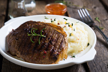 Grilled steak and mashed potatoes