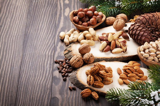 Various nuts on wooden table