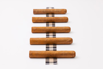 Luxury Cuban cigars on the white desk