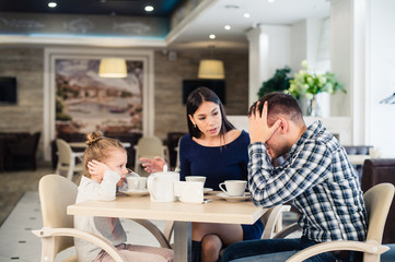 Little girl doesn't want to hear arguing of parents