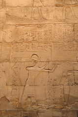 Ancient Egypt. wall are decorated with carved hieroglyphs. Karnak Temple. Luxor. Thebes.