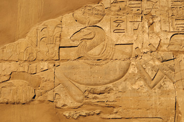 Ancient Egypt. wall are decorated with carved hieroglyphs. Karnak Temple. Luxor. Thebes.