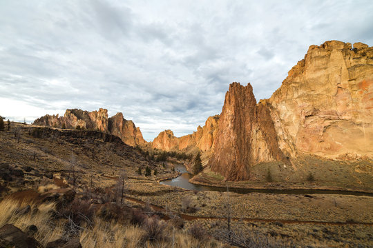 Smith Rock in Oregon with cloudy skies above.