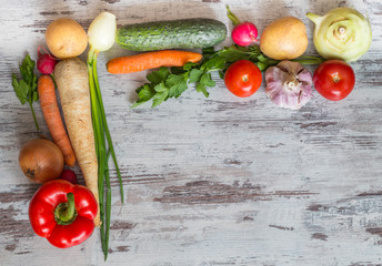 Fresh organic vegetables on table with place for inscription.