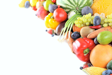 Ripe and tasty fruits and vegetables on a white background