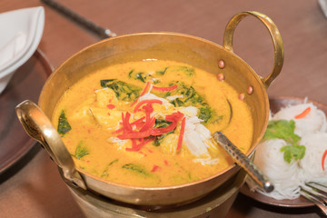 Crab curry in Thai infused red coconut curry sauce
