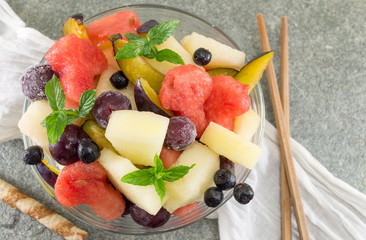 fruit salad in a glass bowl