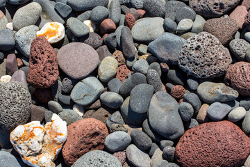 Steine und Kiesel am Strand Closeup Nahaufnahme formatfüllend