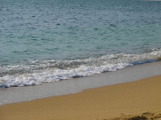 Soft wave of the sea on the sandy beach