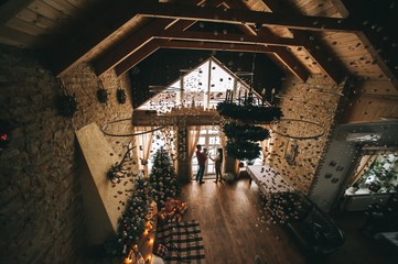 Young family in Christmas interior