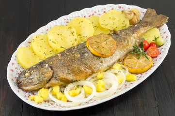 seasoned roasted trout on a plate