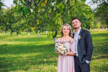 happy groomsman and bridesmaid having fun and laughing