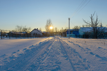 December 11, 2016: Photo of village street with apartment buildi