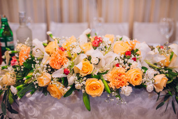 Table set for an event party or wedding reception. decorated wedding table in the restaurant. Wedding ornament from balloons. Valentines day dinner with holiday elegant heart ornaments. wedding arch.