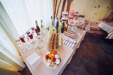 Delicious wedding reception candy bar dessert table