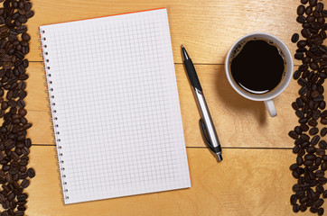 Notebook and coffee