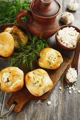 Baked buns stuffed with curd cheese