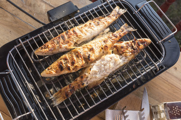 Fish perch baked at home on the grill