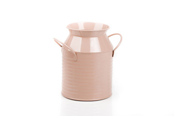 Light pink iron/metal can/ bucket/pail/container with handles isolated on white background. Colorful kid child toys. Cream color garden equipment. Food storage tray. Side view. Closeup.