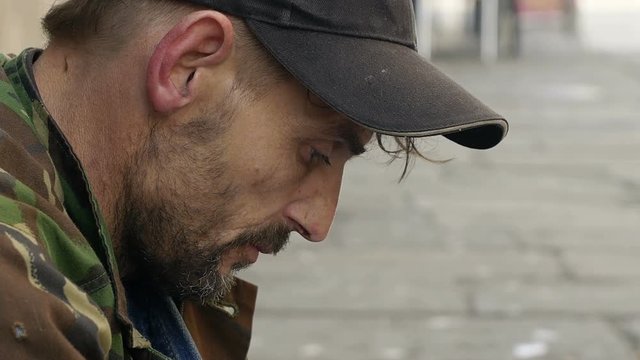 jobless, job loss, homeless in the street asking charity: begging man 